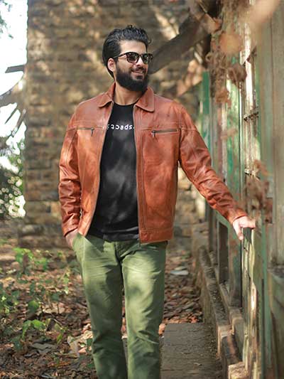 men-tan-leather-jacket-with-olive-green-bottoms-and-black-shirt
