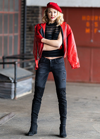 women-in-red-leather-jacket-with-black-top-dual-shade-jeans-and-matching-red-hat-with-golden-hairs