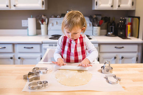 little girl baking cookies - BikeFlip