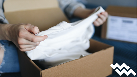 white t shirt in mail delivery