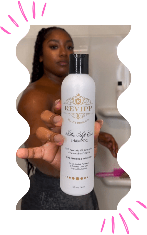 Revipp Beauty Products shampoo bottle being held by woman with curls