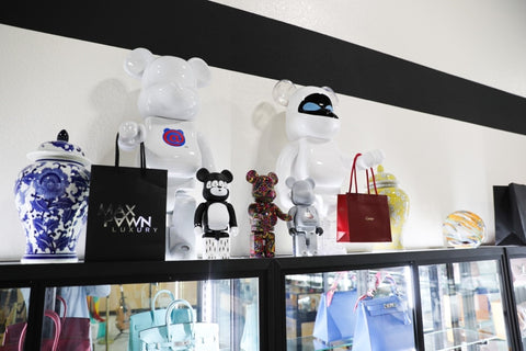 A collection of small and large Bearbricks are on display at Max Pawn.