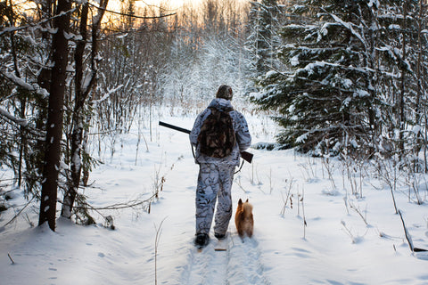 the man is wearing hunting heated vest