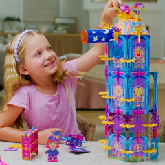 A young girl plays with the Pinxies Star Wish Tower available at Luki Lab.