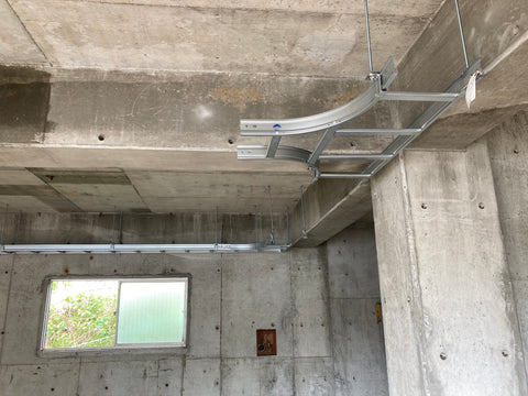 Cable rack (a silver ladder-like device for wiring that hangs from the ceiling)