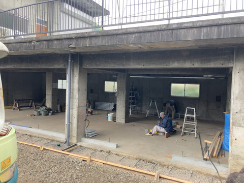 Exterior construction. pouring concrete on the ground