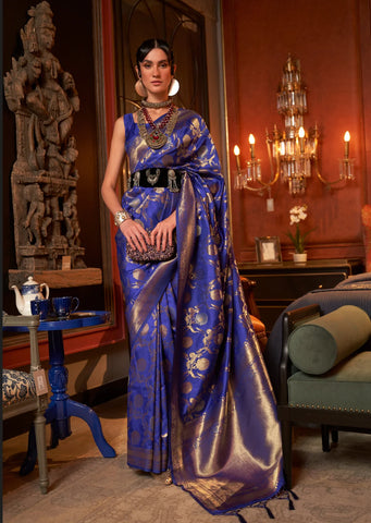 woman standing in blue banarasi saree