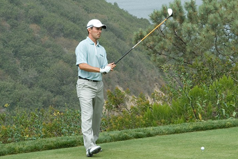 Mike Weir playing golf left-handed