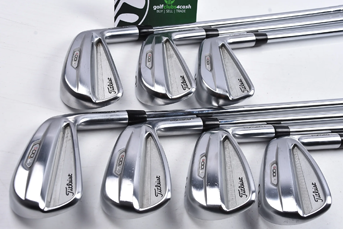 A set of Titleist T100s golf irons