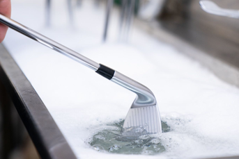 Washing a golf iron