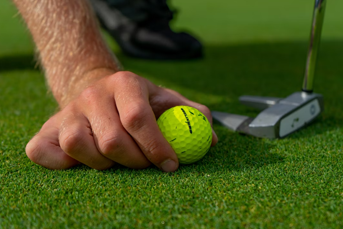 A marked golf ball to help line up your putt
