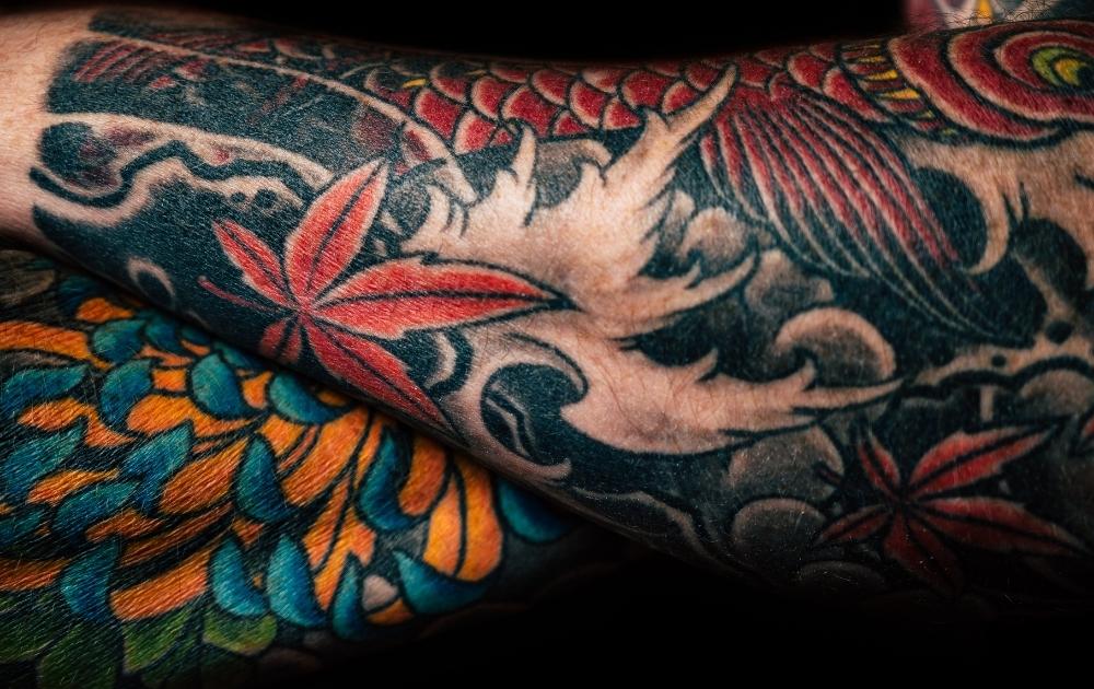 A cover-up tattoo on someones forearm. 