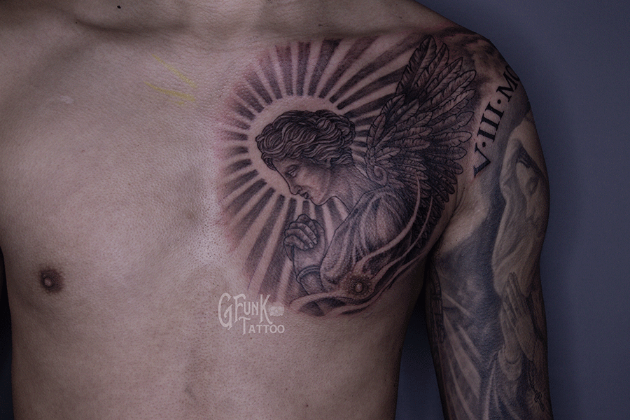 angel tattoo designs for men on chest