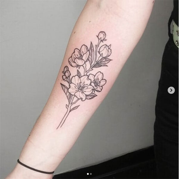  fine line style tattoo of a flower hat woman