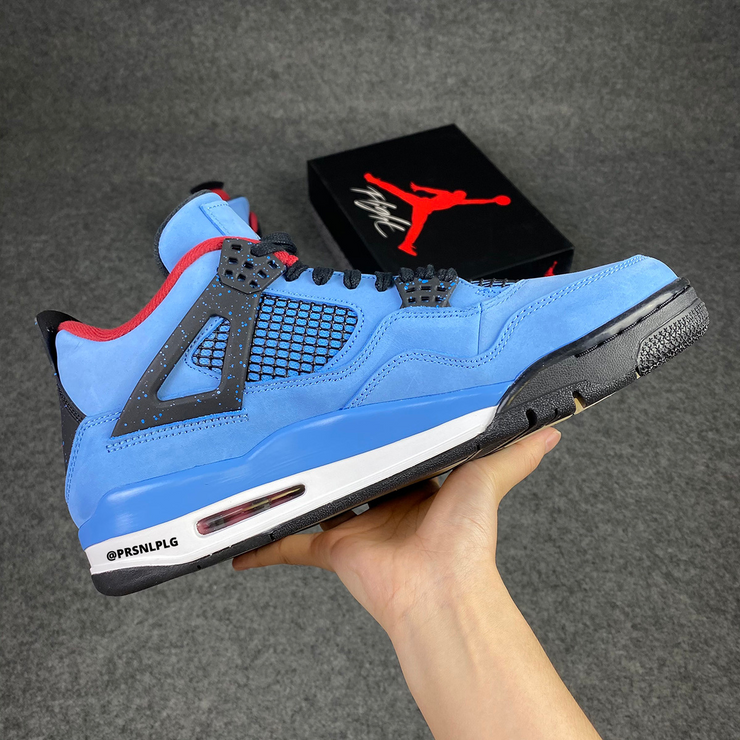 Travis Scott x Air Jordan 4 Houston Oilers In Hand - JustFreshKicks