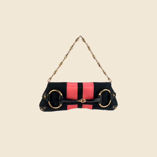 GUCCI HORSEBIT SHOULDER BAG BY TOM FORD, black canvas with black leather  trims and handle, adjustable shoulder strap, copper toned horsebit and  central satin stripe, 26cm x 18cm H x 7cm.