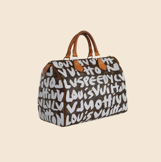 Limited Edition Louis Vuitton x Stephen Sprouse Graffiti Pochette Acce –  Fancy Lux