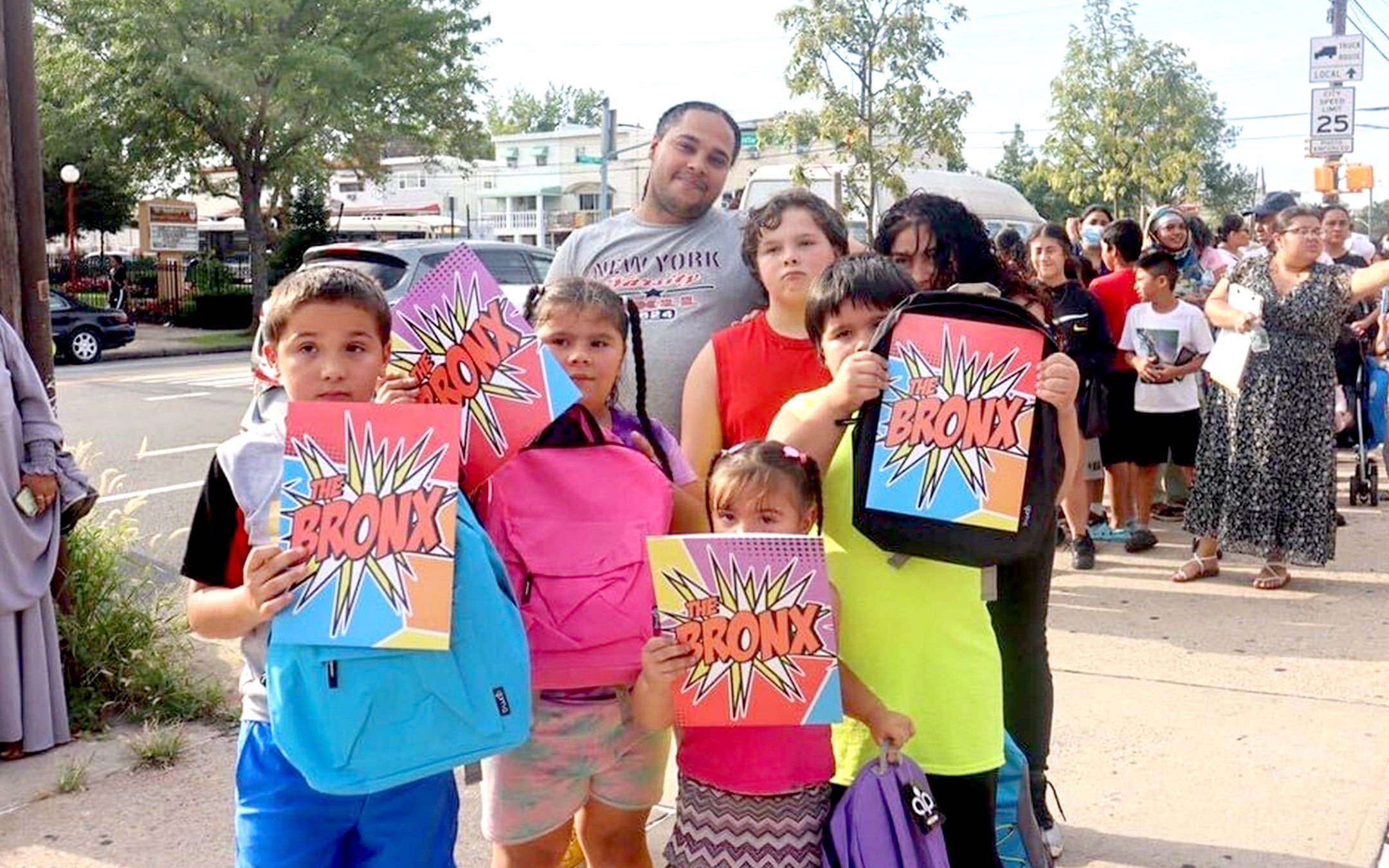 PICTURED: Bronx students showing off their new Bronx POW! Folders