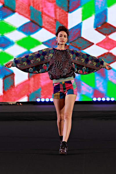 silhouette jumper with embroidered sleeves multicolored shorts Bangkok fashion show