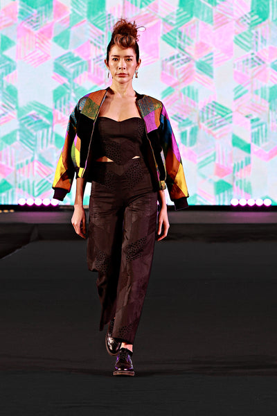 silhouette pants and black bustier Thai silk multicolored bomber jacket Bangkok fashion show