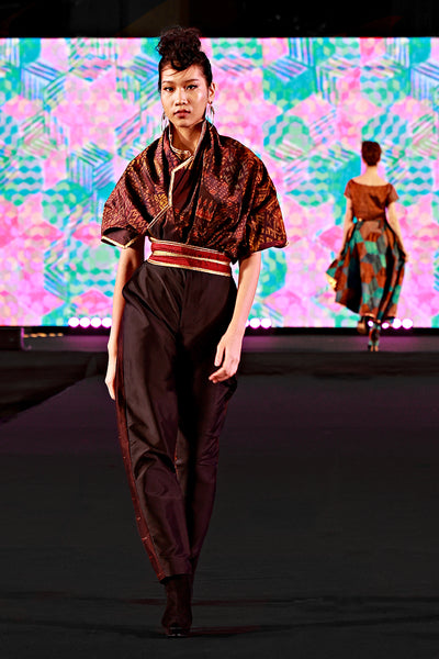 Thai silk silhouette copper shawl black pants Bangkok fashion show