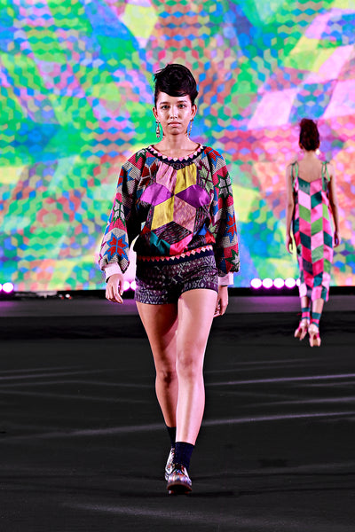 sweater silhouette pink embroidered sleeves aubergine shorts fashion show Bangkok