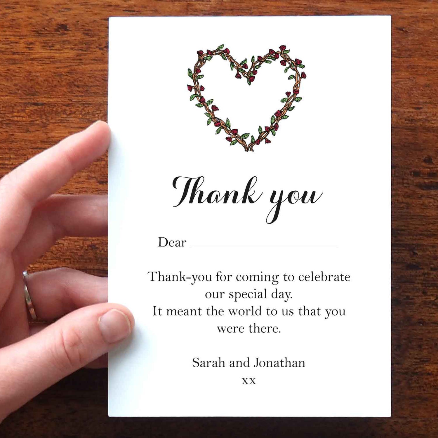 a-thank-you-card-with-musical-notes-and-a-blue-bead-on-the-tag-that