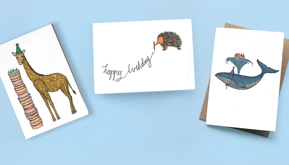 3 quirky birthday cards on a blue background