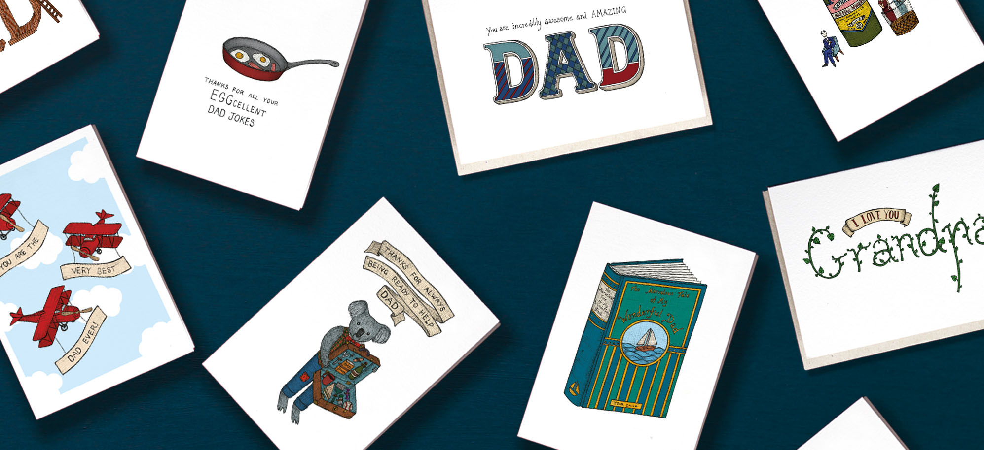 Assorted hand drawn Father's Day cards on blue background
