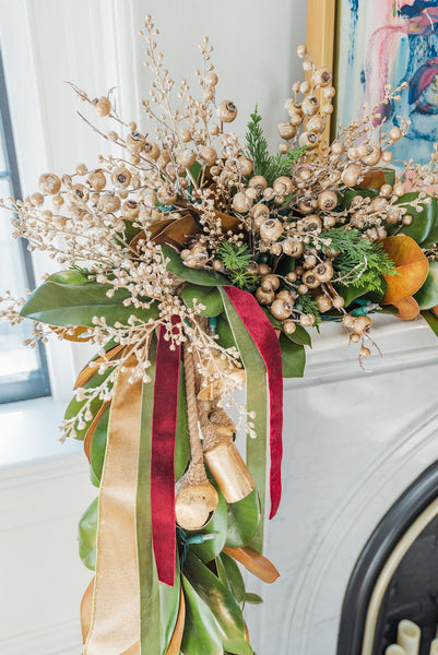 Magnolia Garland with gold picks for a southern charm Christmas mantle