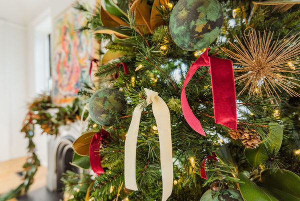 Dark Red and Cream velvet ribbon tied in bows on a christmas tree