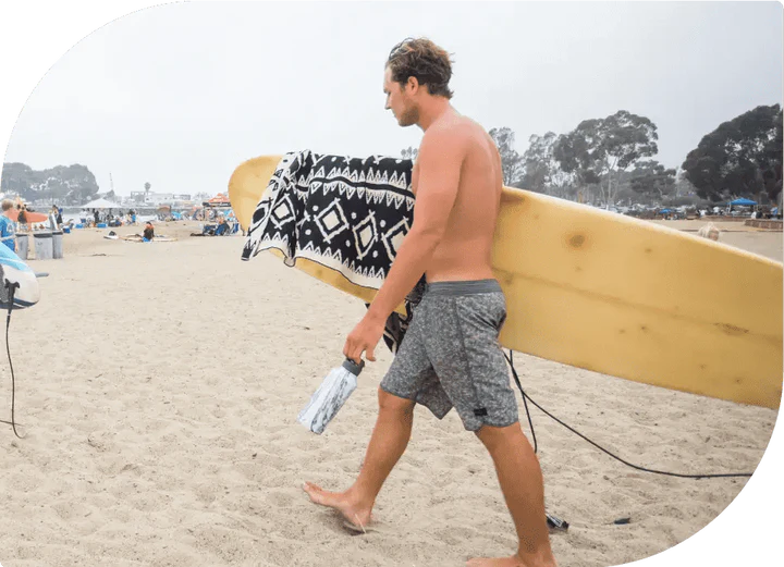 California surfer holding bottle