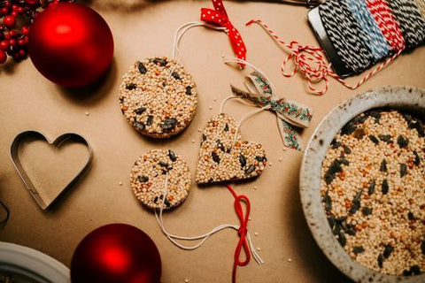 birdseed cookies on a table overhead view with cookie cutter