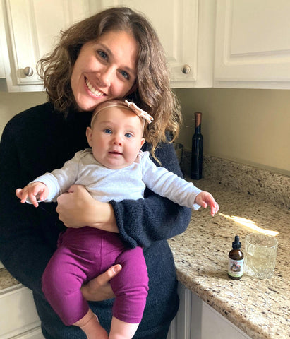 Brittney Torrance with Baby and WishGarden Herbs ReBalance After Birth Hormonal
