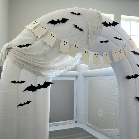 mini bounce house with halloween decorations