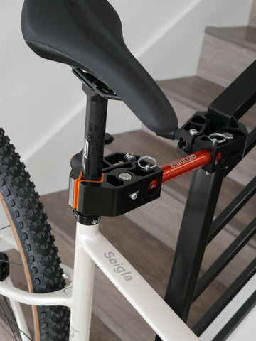 Lauf Seigla Weekend Warrior Wireless Out of the box being assembled using the Altangle Hangar Connect bicycle work stand for travel and on the go maintenance AKA mount anywhere work stand. Close up on the bicycle repair stand and gravel bike with 2.2 maxxis ikon tires