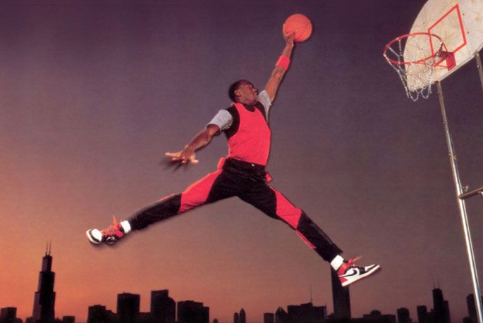 Michael Jordan jumping in the air for a dunk