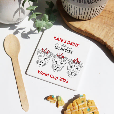white acrylic coaster printed with the message [insert name] Drink for watching the Lionesses World Cup 2023