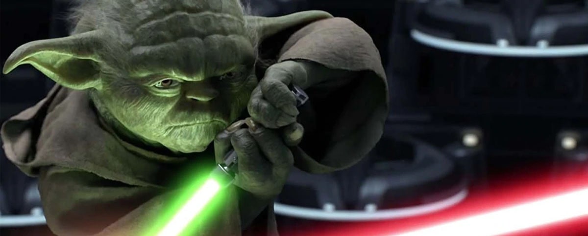 Yoda combatte con la sua spada laser verde