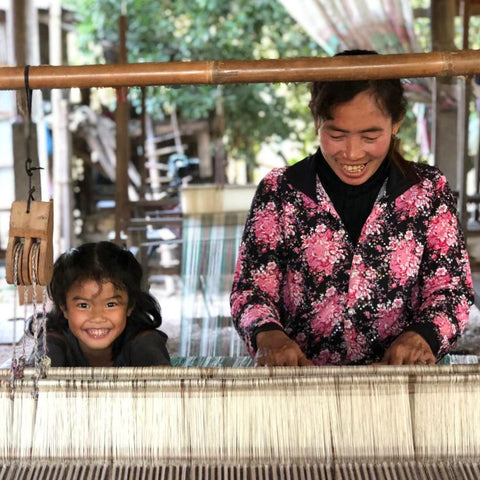Artisan woman weaving in Cambodia