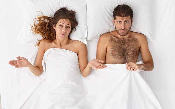 Bild zeigt Paar in Bett