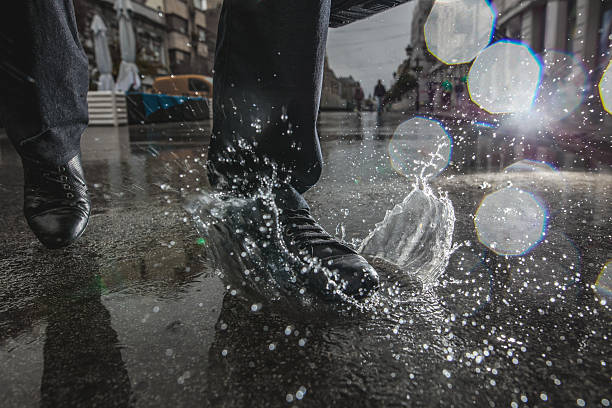 Dirty shoes in the rain