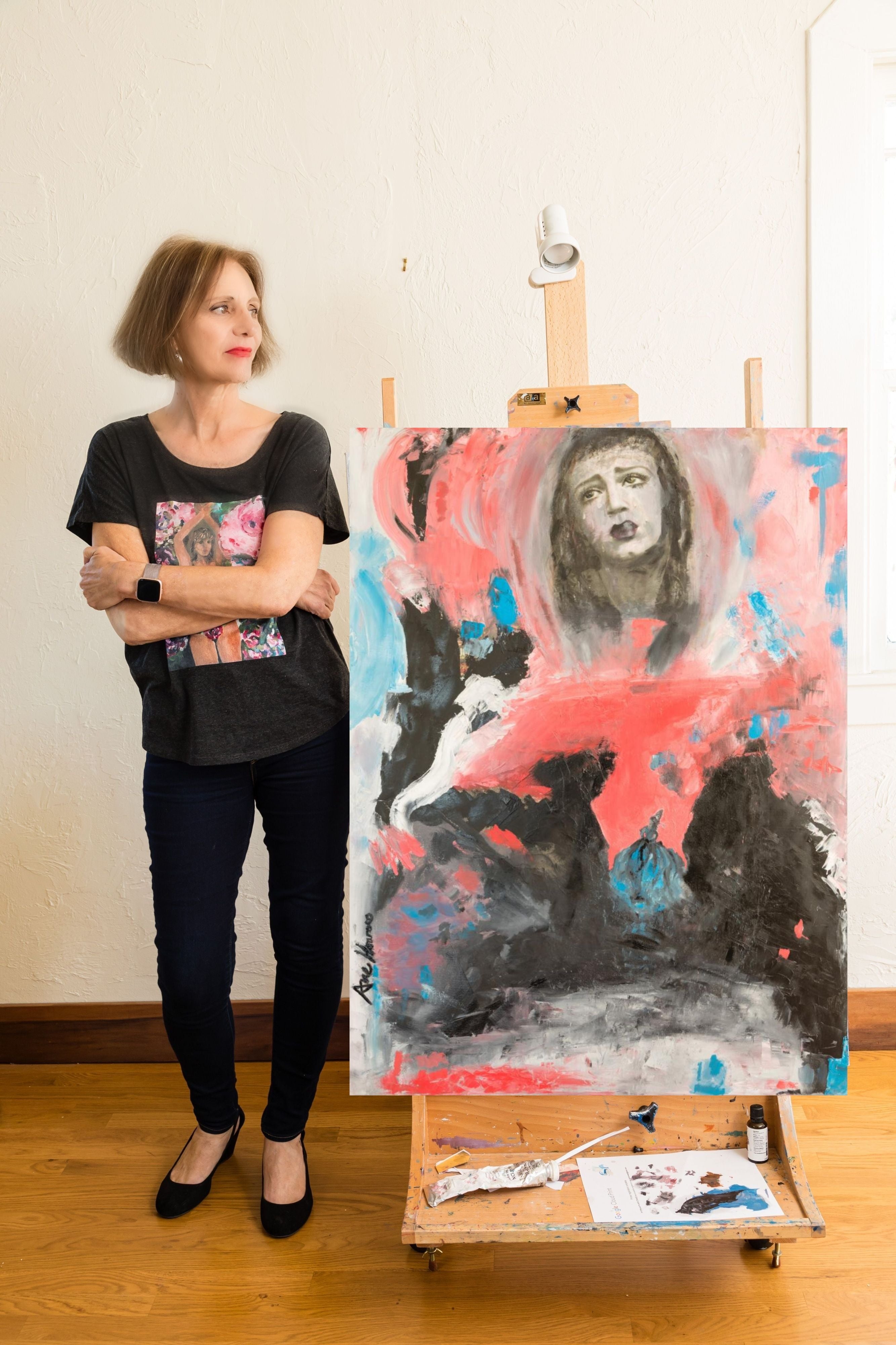 Ane Howard in front of painting