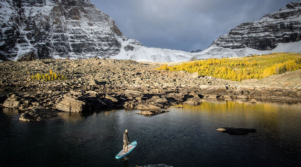 paddle boarding on a lake