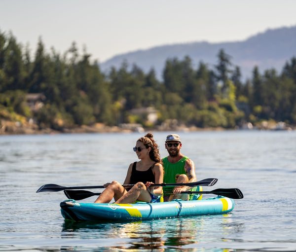 Two people in the iROCKER inflatable kayak.