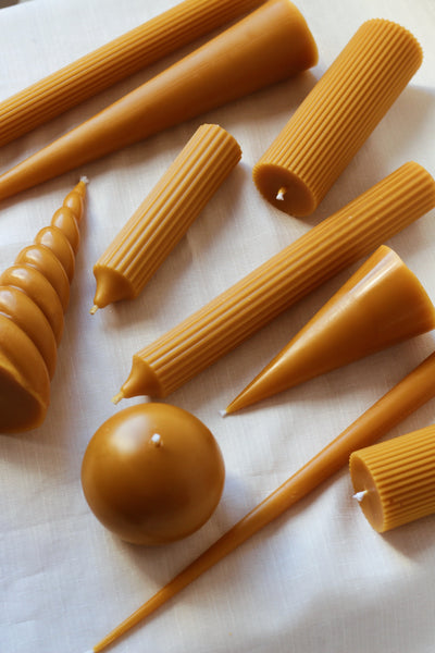 making beeswax candles using molds