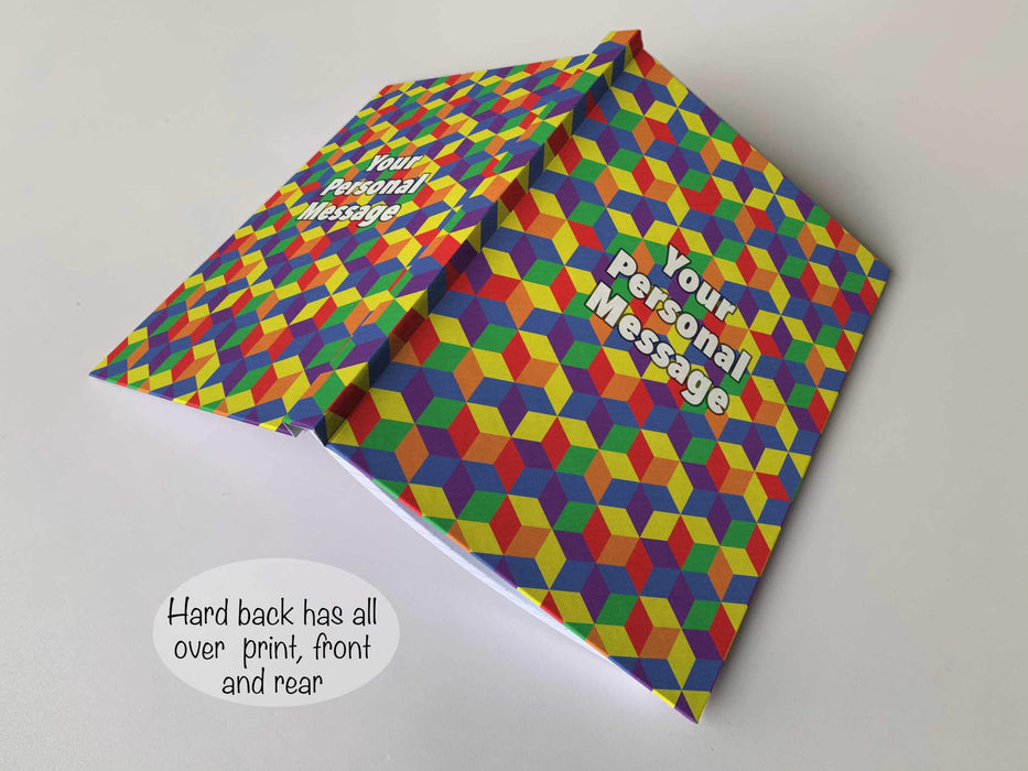 An opened hardback noteback such that you can see the front and reach cover, the cover being a series of 3D cubes coloured using the pride rainbow flag