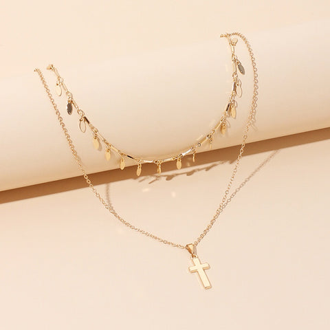 Multi layered cross necklace