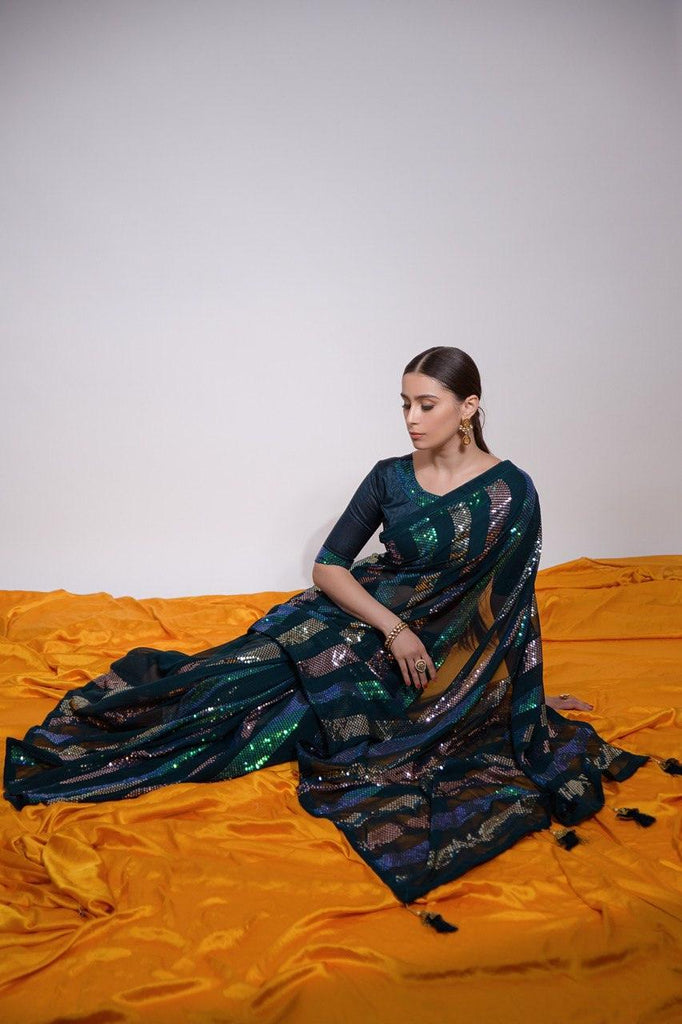 https://cdn.shopify.com/s/files/1/0559/9497/4251/files/rainbow-sparkle-or-ready-to-wear-striped-sequins-saree-glamwiz-india-1_662fbff1-f8d1-4ea5-9f5e-84d4beab2357_1024x1024.jpg?v=1692502642