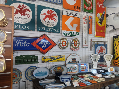 Vintage enamel signs on a wall